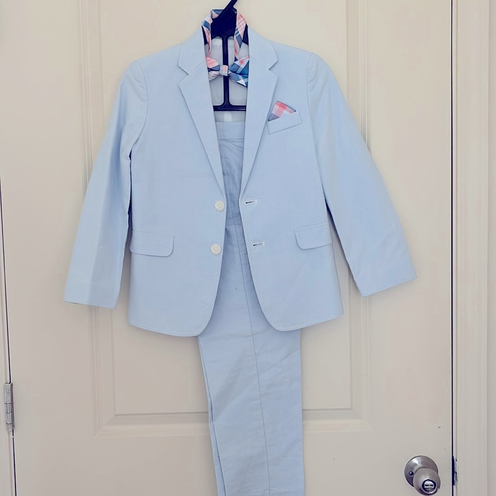 Boy and girl wedding suit and dress.